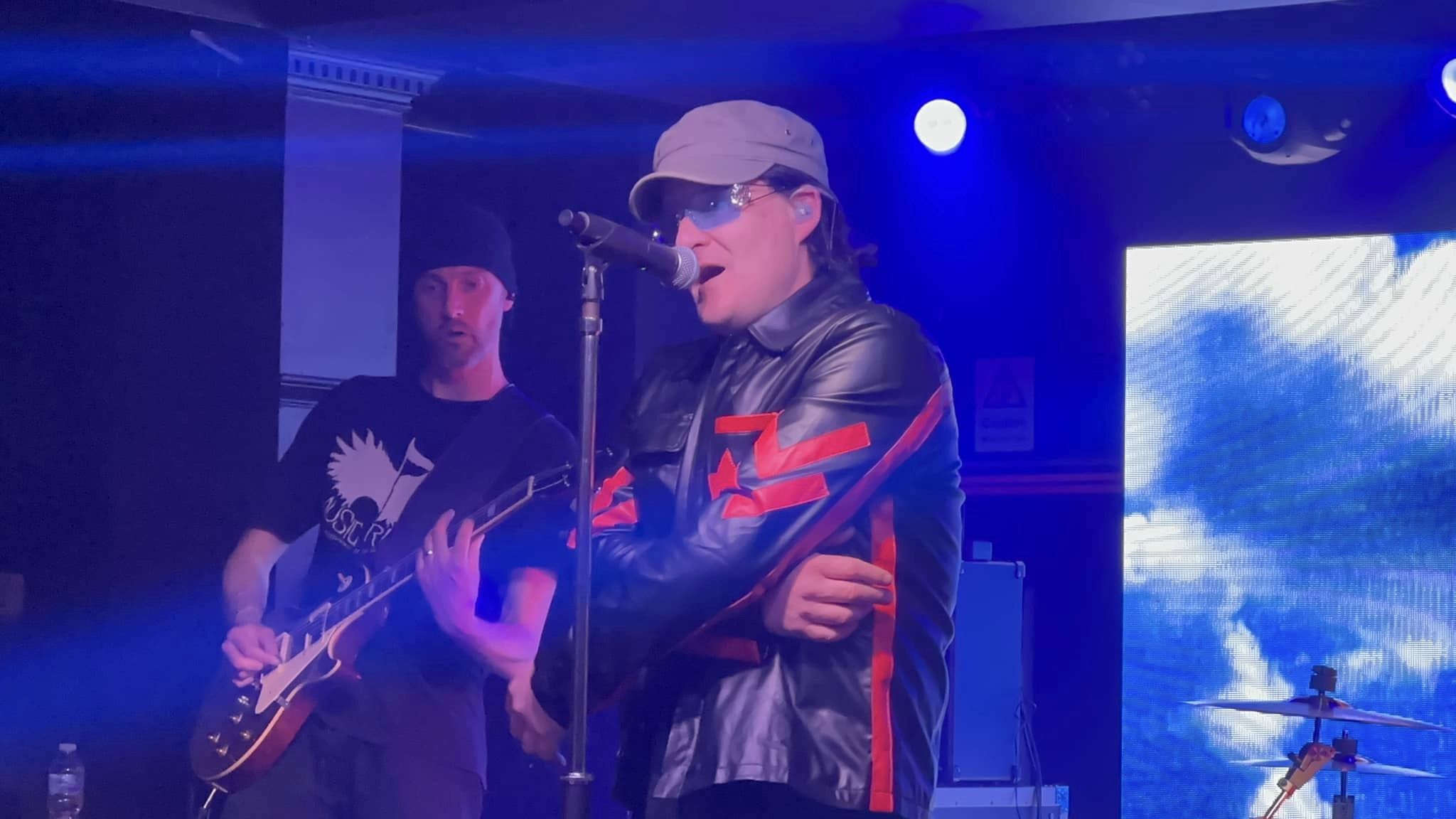 Bono performing on stage